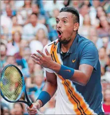  ?? JASON DECROW/AP PHOTO ?? Nick Kyrgios reacts to a winning shot by Roger Federer during the third round of the U.S. Open on Saturday.