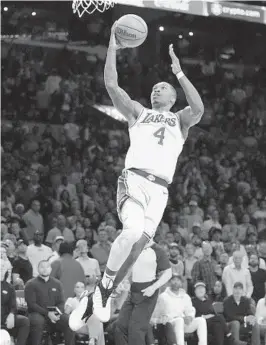  ?? MARCIO JOSE SANCHEZ AP ?? Lakers guard Lonnie Walker IV, who scored all of his 15 points in the fourth quarter, goes up for a layup against the Warriors in Game 4 of their series.