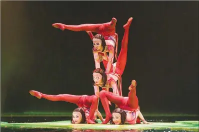  ?? TOMASZ ROSSA ?? Contortion­ists perform in Cirque du Soleil’s “O” at Bellagio. The show, shuttered since this spring because of the coronaviru­s pandemic, is expected to be the first Cirque show to reopen on the Las Vegas Strip in 2021.