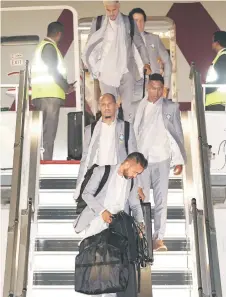  ?? — AFP photo ?? Brazil’s teams arrive at the Hamad Internatio­nal Airport in Doha, ahead of the Qatar 2022 World Cup football tournament.