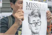  ?? AGENCIES NYT ?? A protester outside the British Consulate in Hong Kong last year during a rally to express support for Simon Cheng.