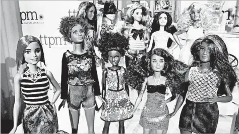  ?? RICHARD DREW/AP ?? Toy companies are selling more inclusive products, including Barbie dolls, above, in many shapes, sizes and skin tones, as well as others with disabiliti­es.