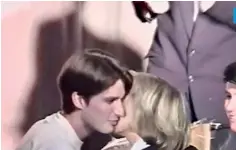  ??  ?? 16-year old Emmanuel kisses Madame Auziere on each cheek after successful completion of school play. Pic courtesy 'The Meteor's Strategy' France 5