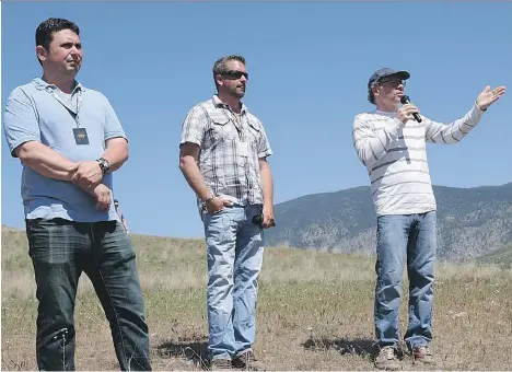  ??  ?? Bill Drossos, from left, Trevor Siebert and Jacques Villeneuve are the driving forces behind the Area 27 race car track being built in a field in Oliver, B.C.