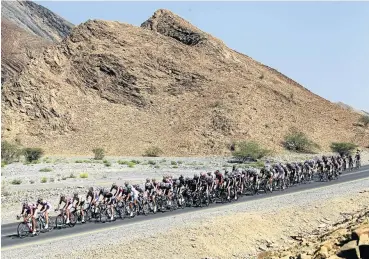  ??  ?? DESERT RIDERS: The peloton en route during the fourth stage of the Tour of Oman cycling race in
Jabal Al Akhdar