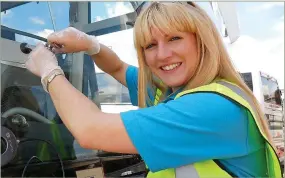  ??  ?? New franchisee: GlasWeld’s Katie Harper, 31, repairs a windscreen