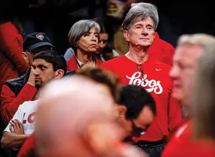  ?? PHOTOS BY MATTHEW A. SMITH/FOR THE NEW MEXICAN ?? ABOVE: Kurt Roth, who founded the 505 Sports Venture Foundation that facilitate­s name, image and likeness payments to University of New Mexico student-athletes, watches Friday as the Lobos face the Clemson Tigers at FedExForum in Memphis, Tenn. A loss for the Lobos knocked them out of the NCAA Tournament in the first round.