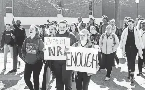  ?? MEMPHIS COMMERCIAL APPEAL ?? University of Memphis students stage a walkout last month. Many are planned Friday, the anniversar­y of the Columbine shooting.