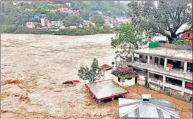  ?? ?? Bathing ghats submerged at the confluence of Alaknanda and Pindar rivers in Chamoli on Tuesday. ANI