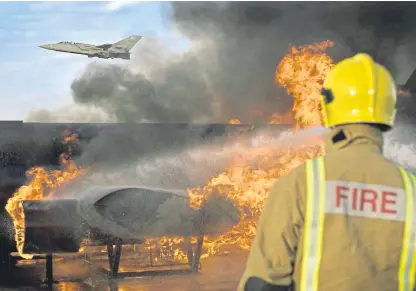  ??  ?? There are fears that privatisin­g military fire and rescue services will put lives and jobs at risk.