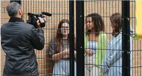  ??  ?? Locked down: Students at Manchester Metropolit­an University being interviewe­d