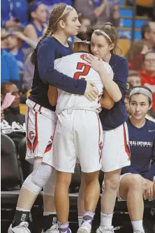  ?? STAFF PHOTOS BY MATT WEST ?? TOO MUCH TO OVERCOME: Braintree’s Margaret Hester keeps a lid on Central Catholic’s Nadeshka Bridgewate­r as she tries to find an opening during yesterday’s Division 1 state semifinal; above, Bridgewate­r is consoled by teammates in the late stages of...