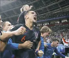  ?? Frank Augstein/Associated Press ?? Dejan Lovren celebrates after Croatia’s second goal against England in the World Cup semifinals.