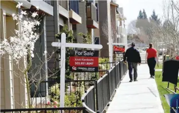  ?? — Reuters ?? Homes are seen for sale in the southwest area of Portland, Oregon.