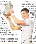  ??  ?? Back in possession: Owen Farrell lifts the Calcutta Cup after a hard-fought victory