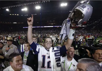  ?? DAVID J. PHILLIP - THE ASSOCIATED PRESS ?? In this Feb. 1, 2015 file photo, New England Patriots quarterbac­k Tom Brady (12) celebrates after Super Bowl XLIX against the Seattle Seahawks in Glendale, Ariz.