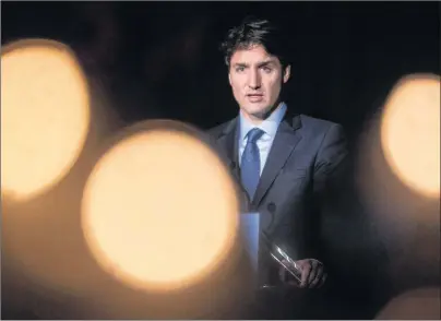  ?? CP PHOTO ?? It’s not Ottawa’s role to challenge a new Quebec law that forbids people from receiving government services with their faces covered, Prime Minister Justin Trudeau.