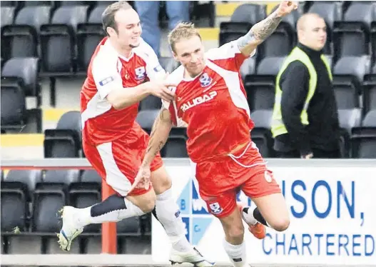  ??  ?? Joy boys
Ryan Stevenson wheels away after smashing home the play- off winner against Airdrie in 2009