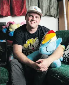  ?? MARK YUEN/POSTMEDIA ?? Rob “Phin” Harrison, who is 38, with his My Little Pony collection and dressed as Rainbow Dash in North Vancouver (opposite page).