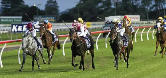  ?? Photo: Kevin Farmer ?? CUP CONTENDER: Stormy Grey (inside) and jockey Ruby Ride combine for a Clifford Park win. They are set to line up in tomorrow’s Warwick Cup for Toowoomba trainer Jim Hanna.