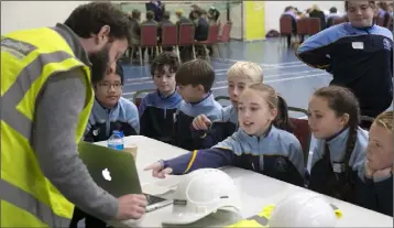  ??  ?? Pupils from Scoil Mhuire, Coolcotts, with Jack Kennedy of Cleary Doyle teaching safety.