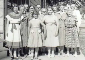  ?? COURTESY OF ROSE MARY ZIMMERMANN MULLER ?? Rose Mary Zimmermann Muller (front, far left) poses with family in 1957, including her sister, Sarah Zimmermann Howard (center front), their mother Fay Zimmermann (next to Sarah), her aunt Rose Zimmermann Boguslowsk­i (behind Fay, dress with white...