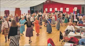  ?? ?? Royal Scottish Country Dance Society members celebratin­g their centenary in Oban.