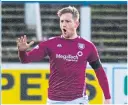  ??  ?? Thomas O’Brien celebrates his equaliser for Arbroath at Palmerston