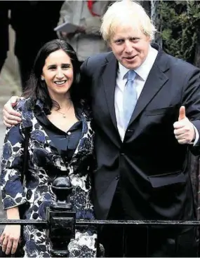  ??  ?? UPBEAT: Boris Johnson in typically bullish mood with wife Marina Wheeler