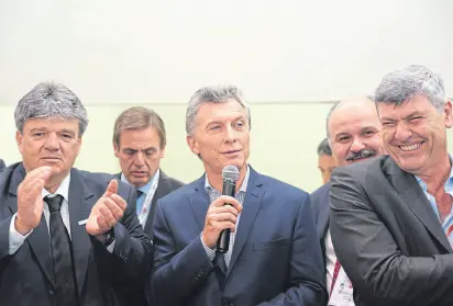  ?? Ipcva ?? Forte, el presidente Macri y Buryaile, en el stand del Ipcva