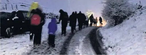  ??  ?? People rescued from their vehicles stuck in the snow at Macclesfie­ld Forest last week were found not to be from Cheshire