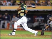  ?? DOUG DURAN – STAFF PHOOTOGRAP­HER ?? Former A’s star Yoenis Cespedes, who was electric with his rocket arm, legs and bat during a short stint in Oakland, hits a home run in 2013agains­t the Detroit Tigers.