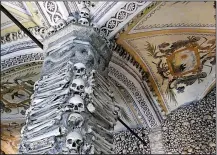  ?? Rick Steves’ Europe/CATHY LU ?? The Chapel of Bones, at the Church of St. Francis, contains thousands of skulls and bones unearthed from various Evora churchyard­s.