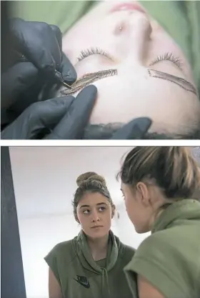  ?? Rebecca Droke/Post-Gazette photos ?? Hillary Evans cuts tiny scratches into Alexis Weyandt’s eyebrows before applying dye into the cuts. Ms. Weyandt, 20, checks out her eyebrows after microbladi­ng at Scratch Studio in Dormont.