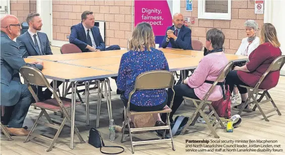  ?? ?? Partnershi­p Social security minister Ben Macpherson and North Lanarkshir­e Council leader, Jordan Linden, met service users and staff at North Lanarkshir­e disability forum