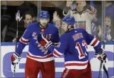  ?? FRANK FRANKLIN II — THE ASSOCIATED PRESS ?? The Rangers’ Rick Nash celebrates his goal with Kevin Hayes (13) during the third period against the Bruins on Wednesday in New York.