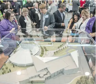  ?? SHAUGHN BUTTS ?? A 3-D model of the $40-million Telus World of Science expansion, dubbed the Aurora Project, was unveiled to the public Tuesday. Constructi­on on the planetariu­m is set to begin in September.