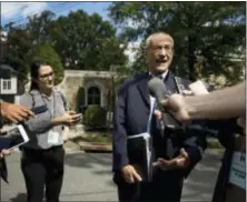  ?? NATI HARNIK - THE ASSOCIATED PRESS ?? Hillary Clinton’s campaign manager John Podesta speaks to members of the media outside Democratic presidenti­al candidate Hillary Clinton’s home in Washington.