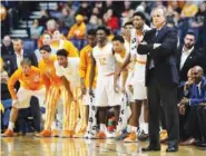  ?? THE ASSOCIATED PRESS FILE PHOTO ?? Tennessee men’s basketball coach Rick Barnes and the Vols watch the second half of their game against Gonzaga last December in Nashville. Two players transferre­d out in the offseason, but the addition of two scoring guards late in the recruiting cycle...