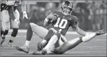  ?? AP/RON JENKINS ?? New York Giants quarterbac­k Eli Manning is sacked for a loss by Dallas Cowboys defensive back Kavon Frazier during Sunday’s game in Arlington, Texas. Manning was sacked six times in a 20-13 loss.