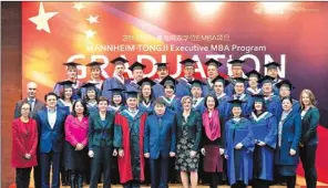  ?? PHOTOS PROVIDED TO CHINA DAILY ?? Participan­ts celebrate their graduation from the Mannheim-Tongji EMBA program in March 2017.