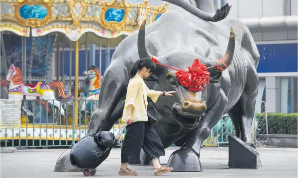  ?? Photo / AP ?? China’s sharemarke­ts have hardly been bullish this year.