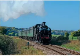  ?? NICK GILLIAM ?? Ivatt 2MT 2-6-2T No. 41294 (41312) passes Wanders Curve with the 11am from Alresford.