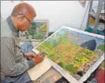  ??  ?? An artist engaged in Kota-bundi style of painting.
AH ZAIDI