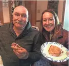  ??  ?? Mike Frank and his daughter Amanda DeSua with one of the sandwiches in their 70th birthday quest. The reuben is his favorite sandwich.
