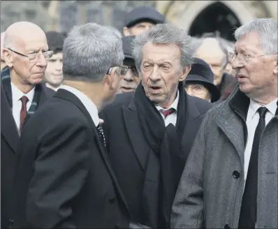  ??  ?? UNITED IN GRIEF: Sir Bobby Charlton, Denis Law and Sir Alex Ferguson outside St Patrick’s Parish Church, in Coleraine, yesterday after the funeral of former Manchester United and Northern Ireland goalkeeper Harry Gregg, inset below, who died earlier this week aged 87.