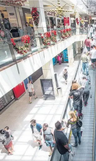  ??  ?? Shoppers packed Auckland malls this weekend as the final countdown to Christmas begins — but are they getting ripped off?