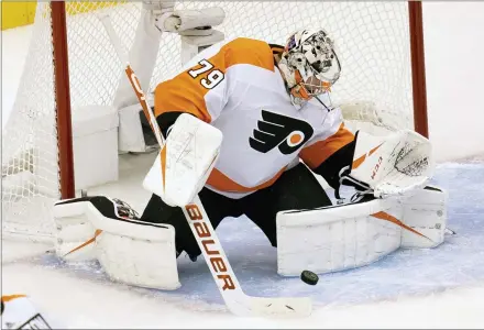  ?? FRANK GUNN — THE CANADIAN PRESS VIA AP ?? Flyers goaltender Carter Hart (79) makes a save against the Bruins during the first period Sunday in Toronto.