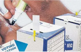  ?? /Business Day ?? Pandemic polls: SA is set for a late local government election next year, as the Covid-19 lockdown regulation­s do not provide for people to leave their houses to vote.