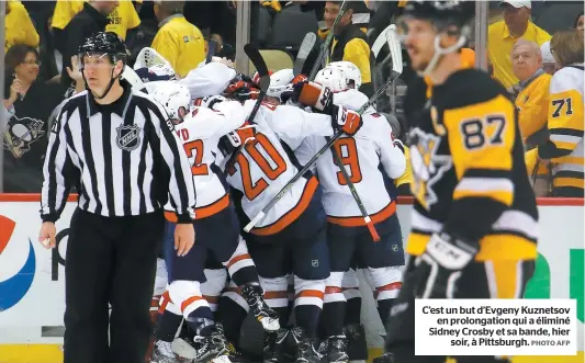  ?? PHOTO AFP ?? C’est un but d’Evgeny Kuznetsov en prolongati­on qui a éliminé Sidney Crosby et sa bande, hier soir, à Pittsburgh.